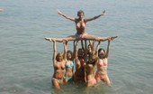 7 Gymnasts On Beach