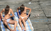 2 Topless Sunbathers